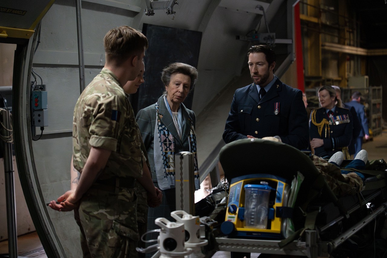 Her Royal Highness The Princess Royal receives information regarding equipment Tactical Medical Wing uses and patient care given.